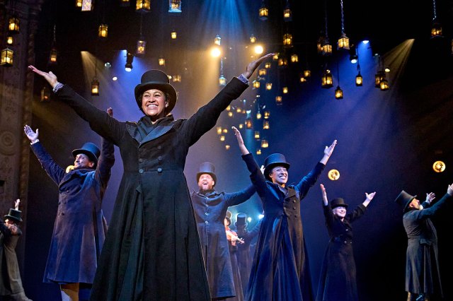 Kimmy Edwards (Mrs Cratchit) and the company in A Christmas Carol at The Old Vic (2024). Photo by Manuel Harlan