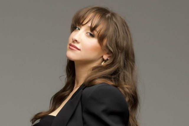 Sydnie Christmas, provided uncredited