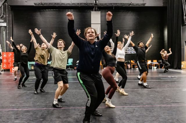 Joel Montague and the cast of Elf