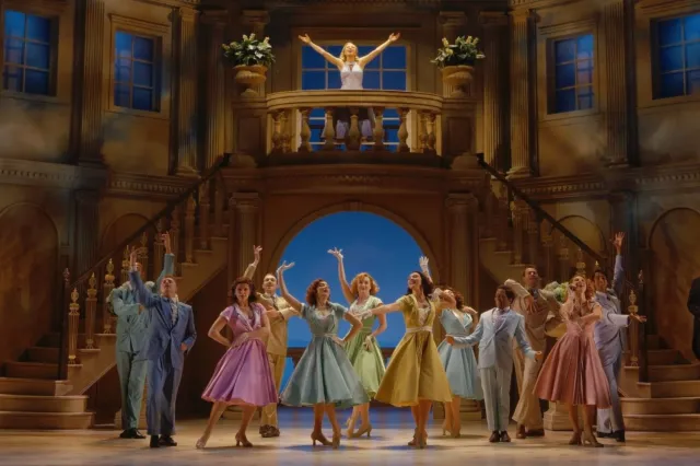 The High Society company on stage, still from the video